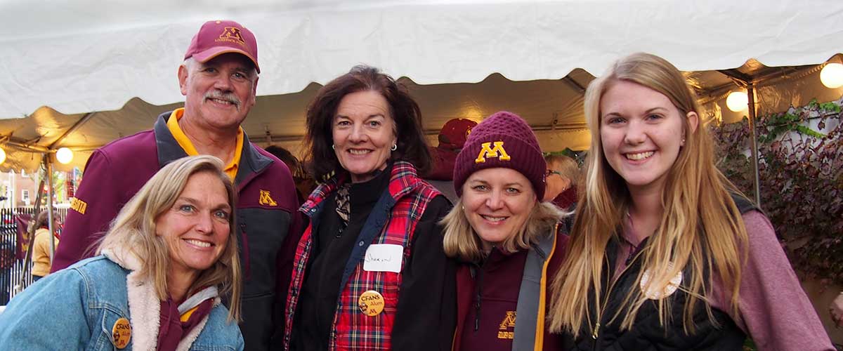 5 CFANS alumni in gopher gear stand together
