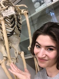 Netanya Sadoff with a skeleton specimen.